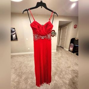 Beautiful bright red floor length silk prom dress.